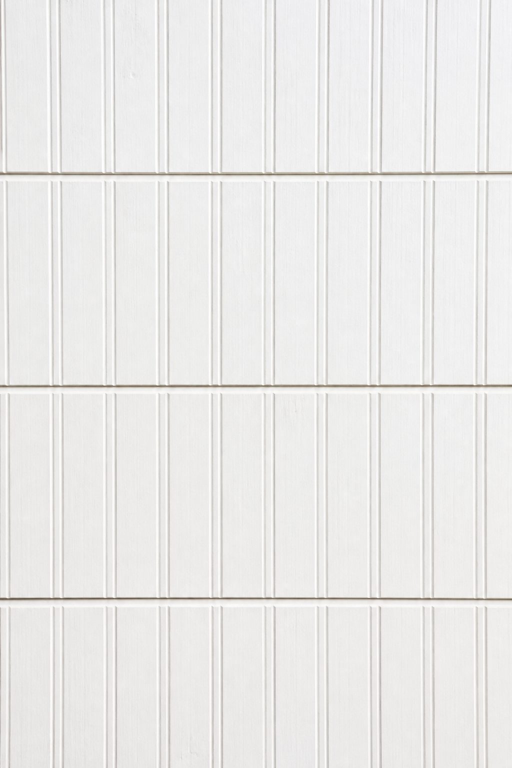 How Can I Make My Bathroom Look Like a Farmhouse 1 White shiplap wall with beadboard texture closeup