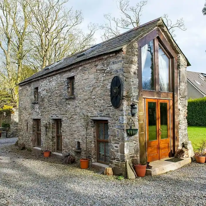 11. Stone Barn Conversion with a Glass Gable