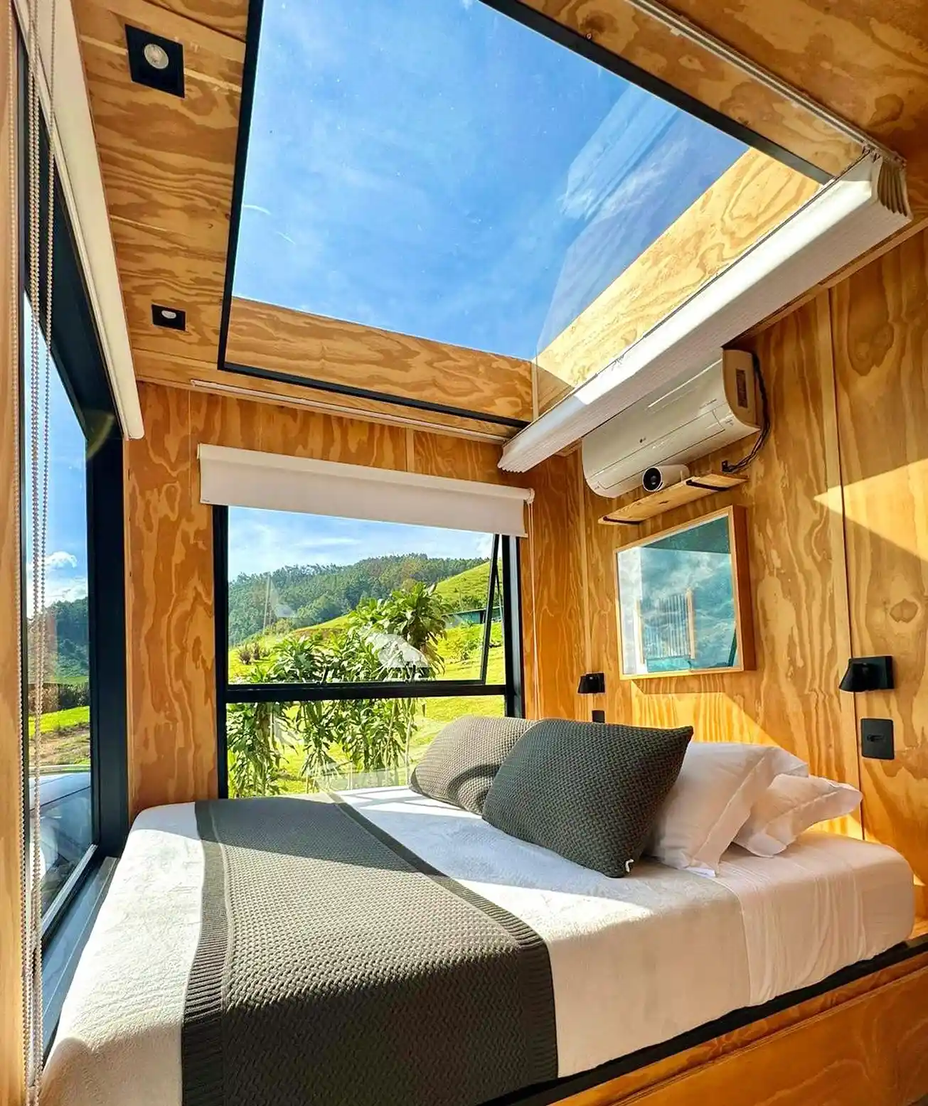 6. Plywood Bedroom with a Skylight