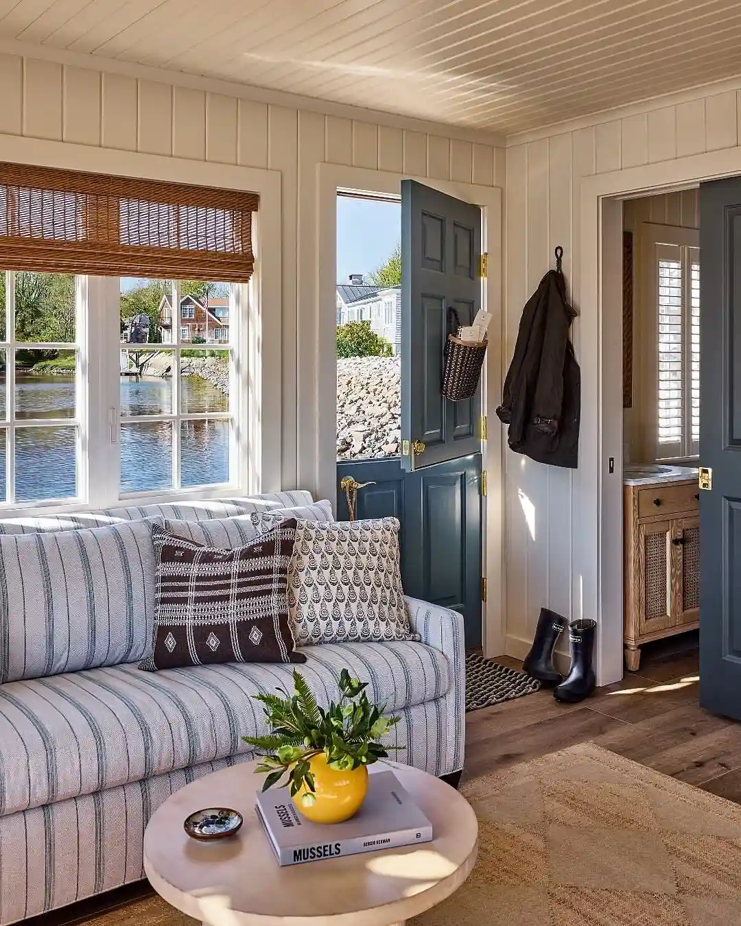 6. An Entry Nook With a Slate Blue Dutch Door
