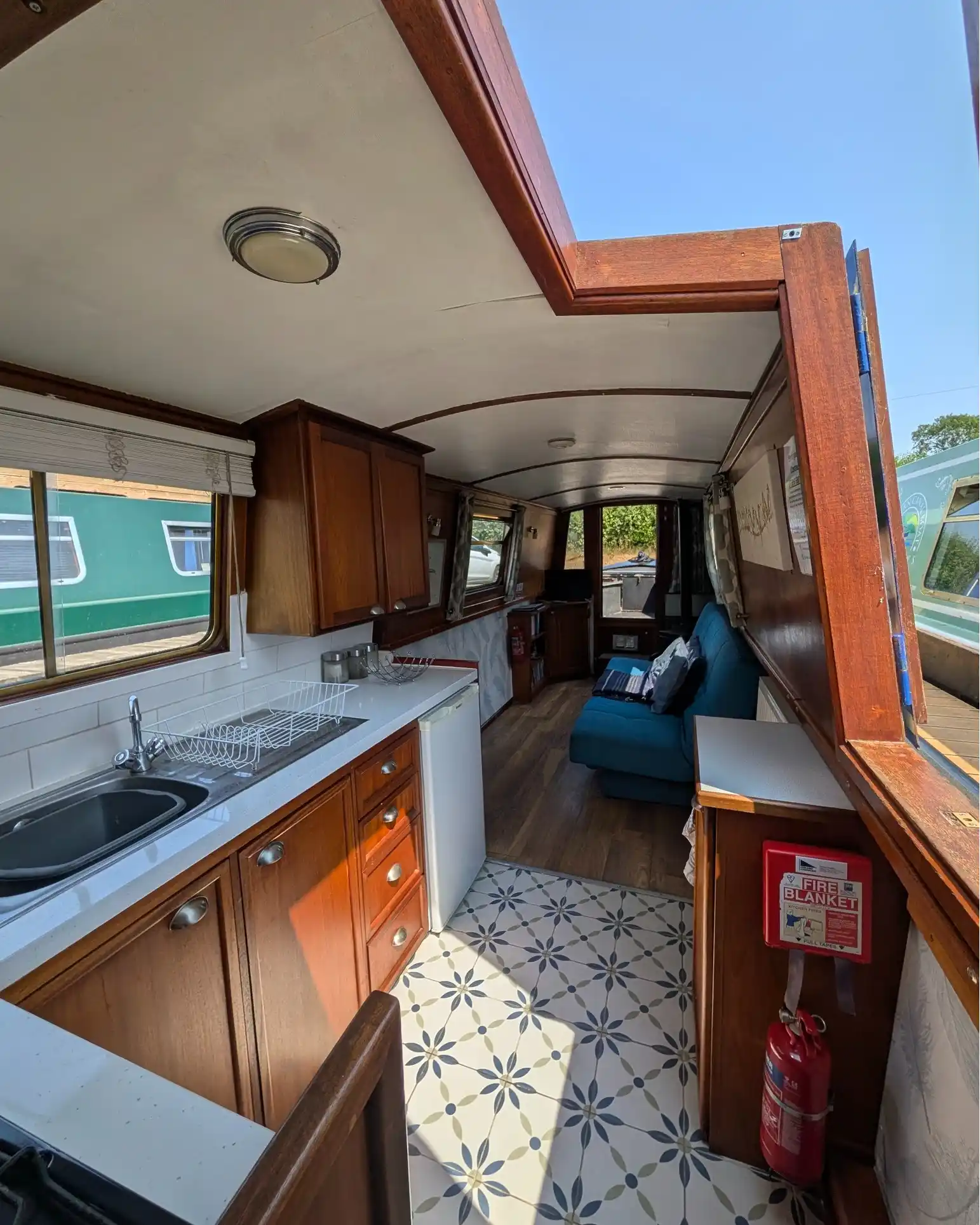 2. A Narrow Boat Galley With Patterned Tile
