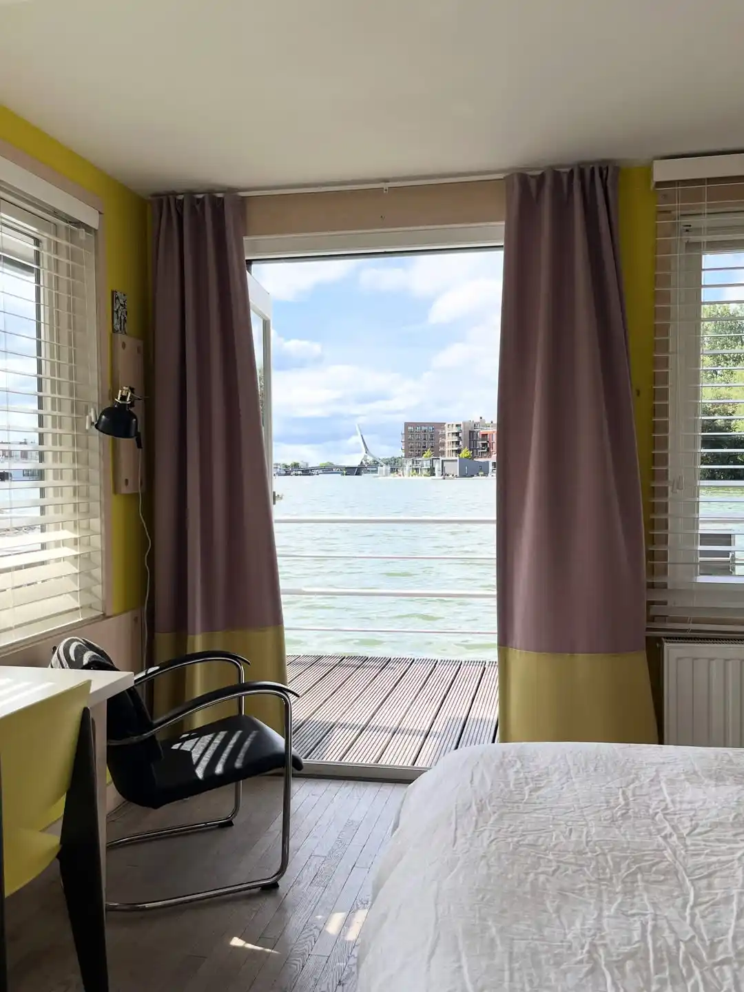 3. Bold Color Block Bedroom with Harbor View
