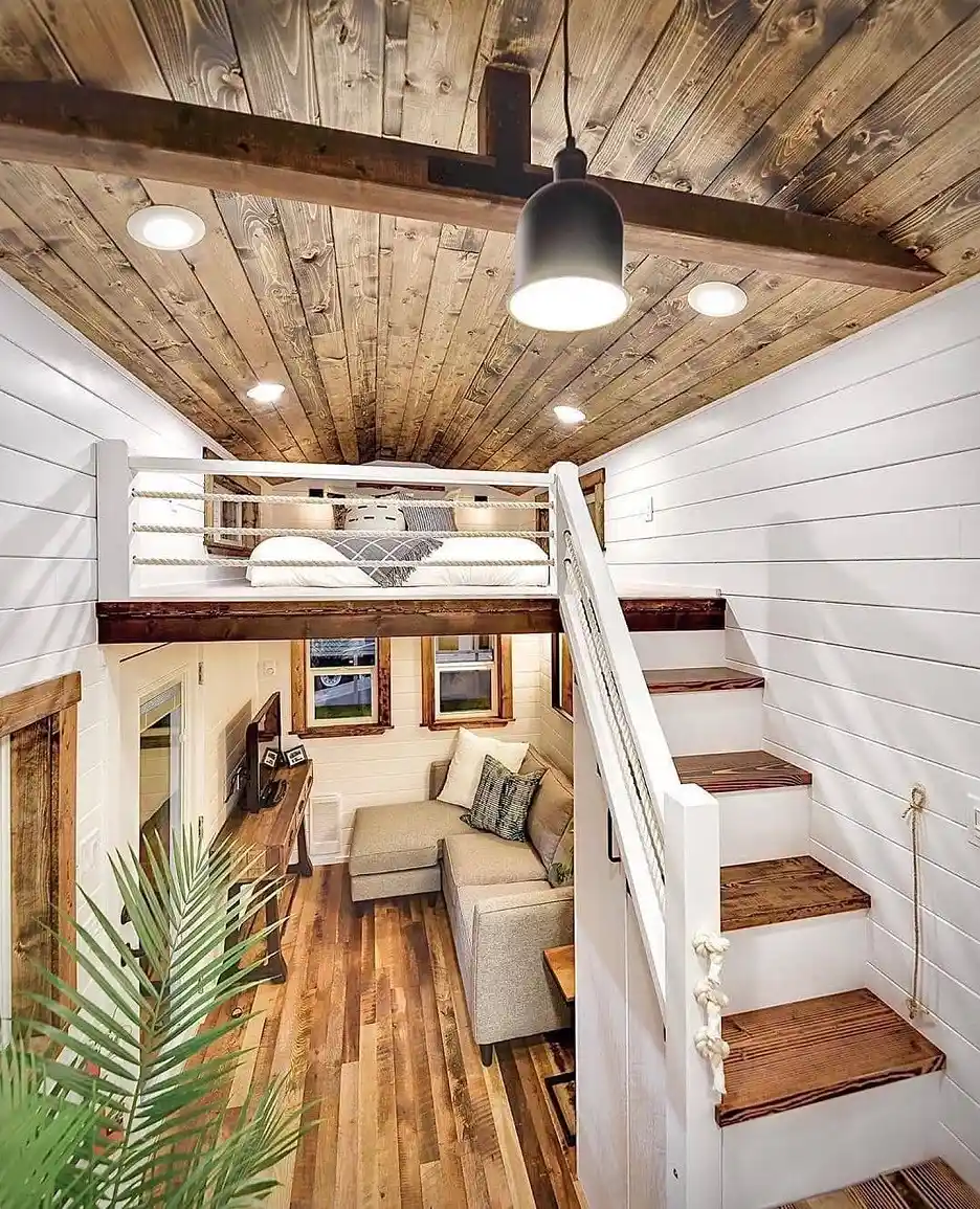 12. Loft Bed Above the Lounge With a Reclaimed Plank Ceiling