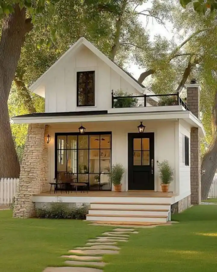 5. Two Story Tiny House with Stone Columns and Rooftop Deck