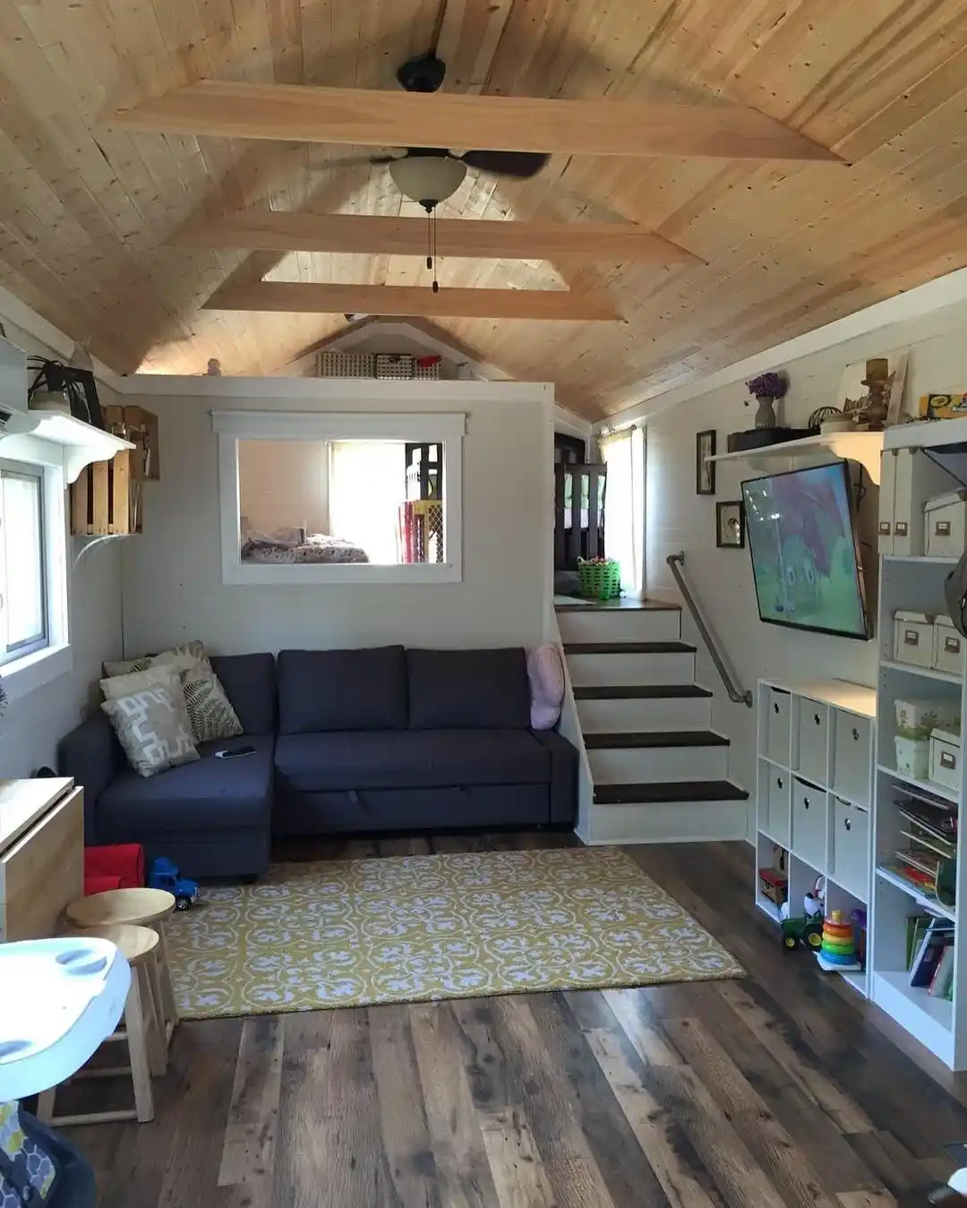 11. Raised Nook and Cube Storage in a Family Cabin
