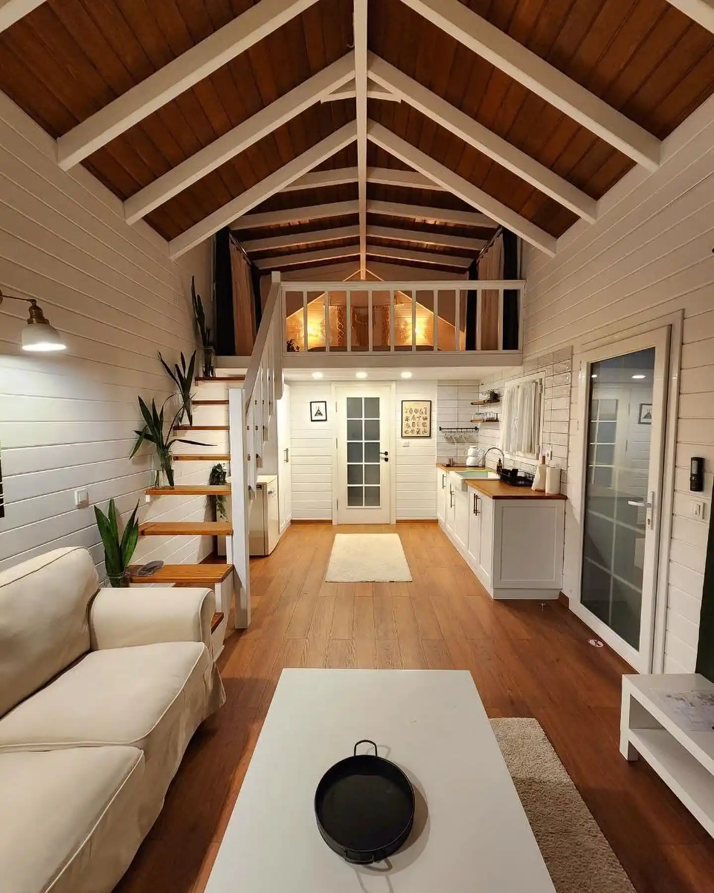 3. Dark Wood Ceiling Framed by White Beams