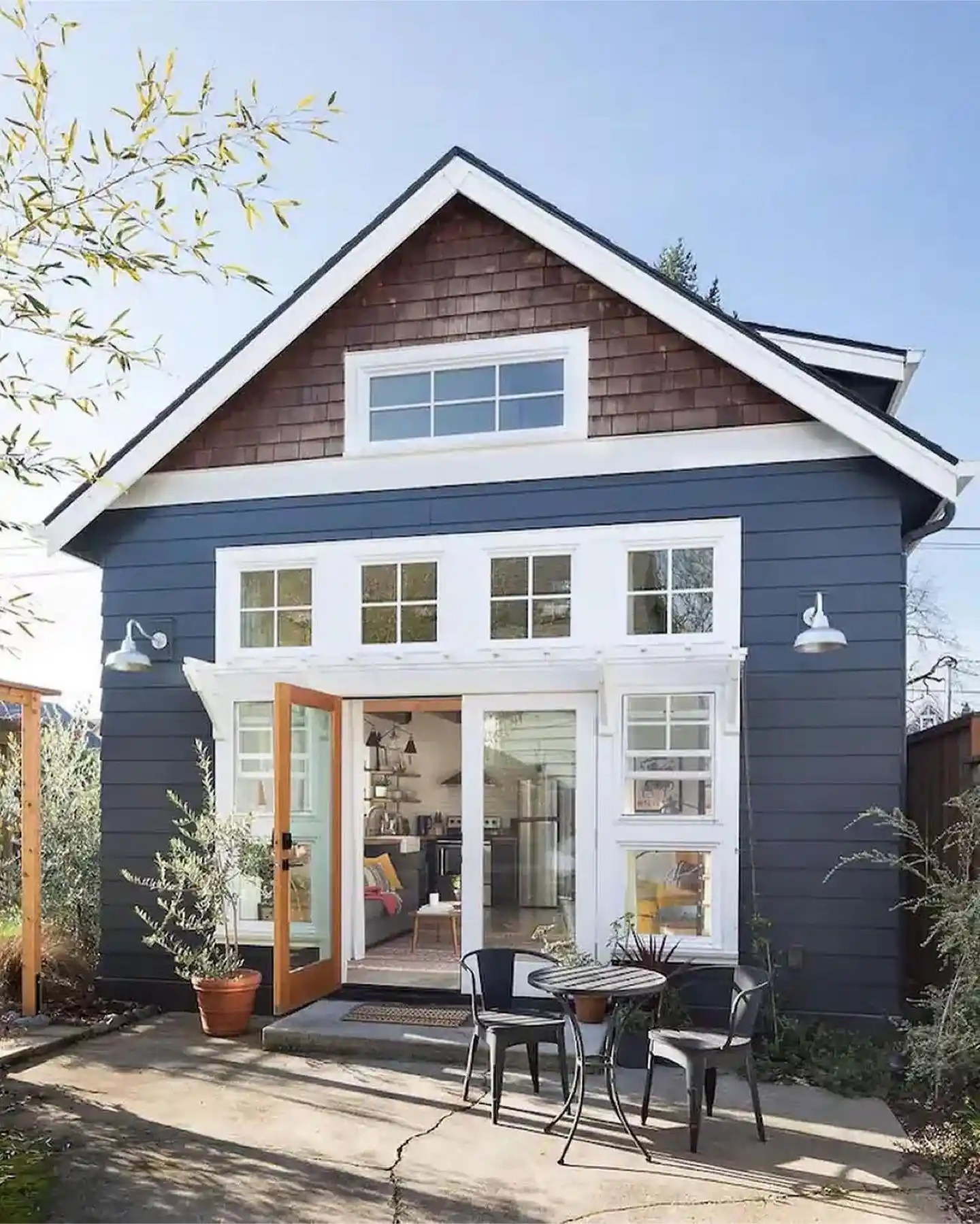 15. Navy Lap Siding and Cedar Shingle Gable With White Trim
