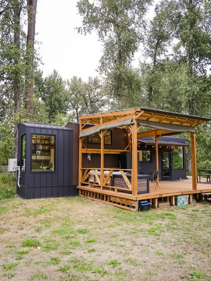 15 Tiny House Ideas for Couples Who Live Small Full-Time 2 1. A Covered Deck That Works as a Second Living Room
