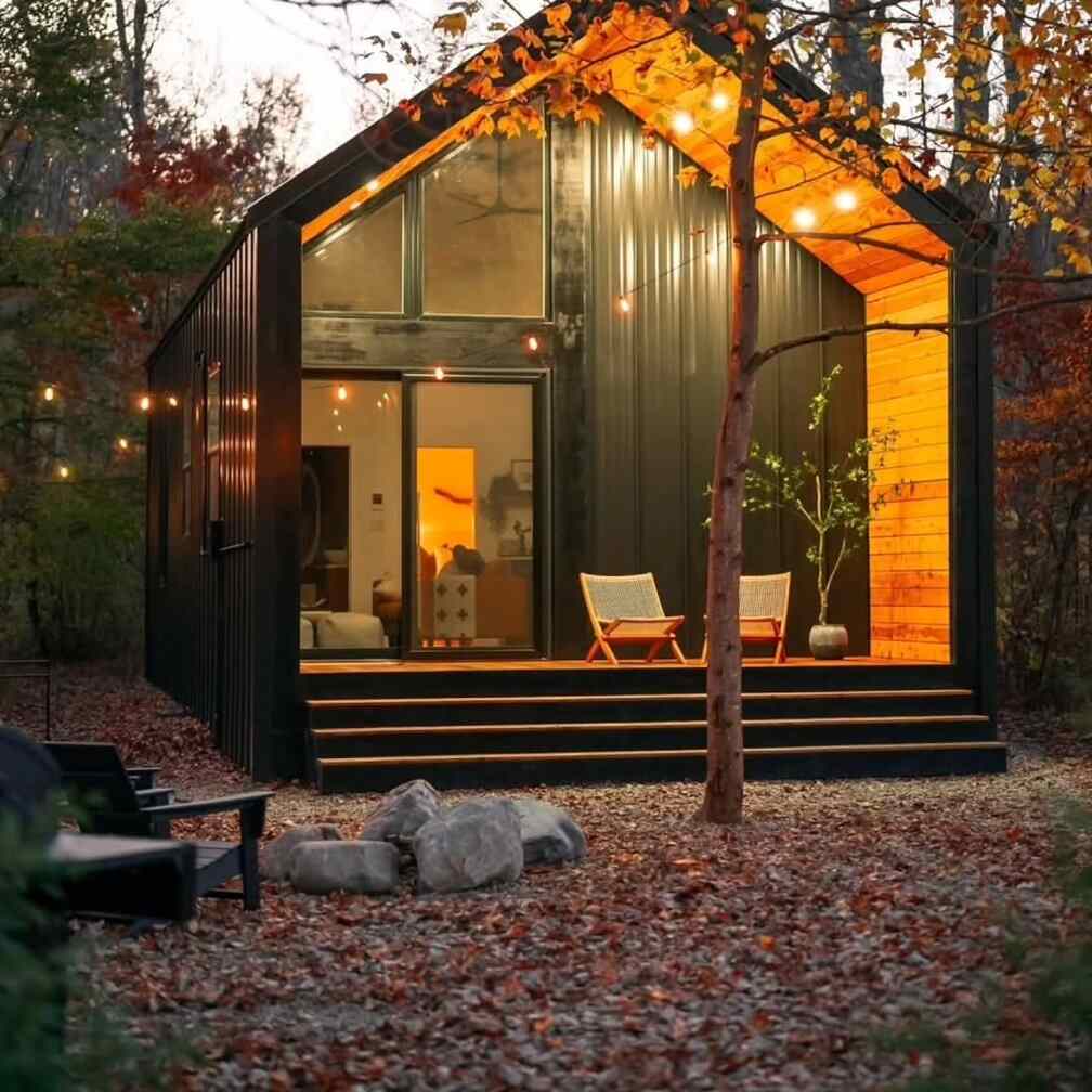15 Tiny House Ideas for Couples Who Live Small Full-Time 5 4. Glass Gable Wall With Forest Views