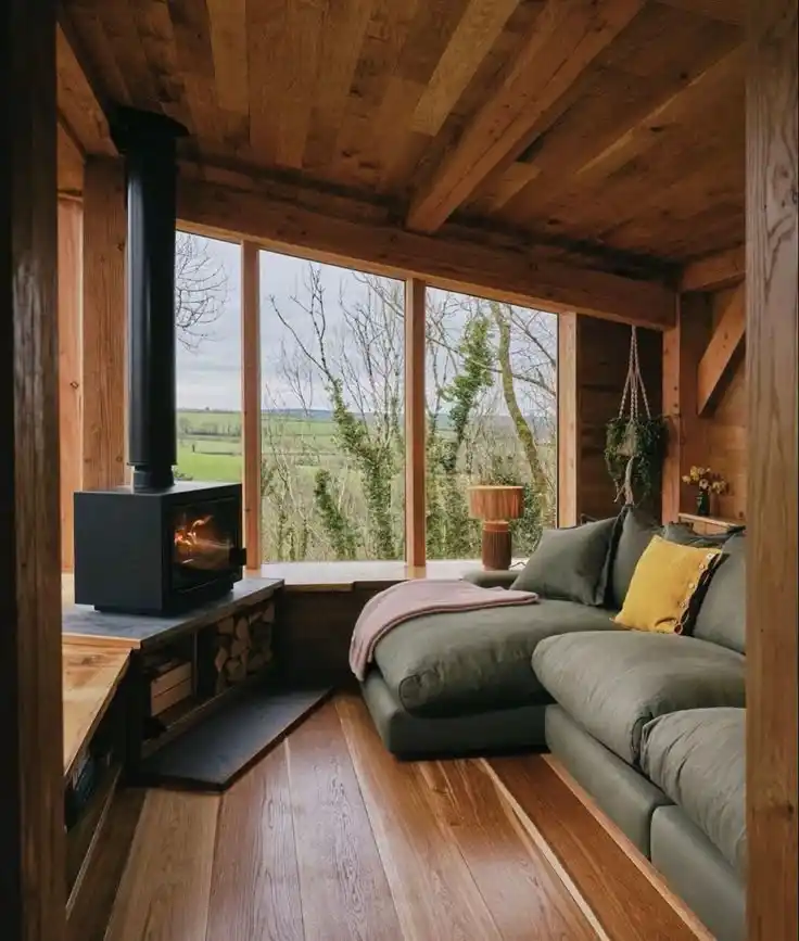 9. A Corner Stove Warms the Whole Loft