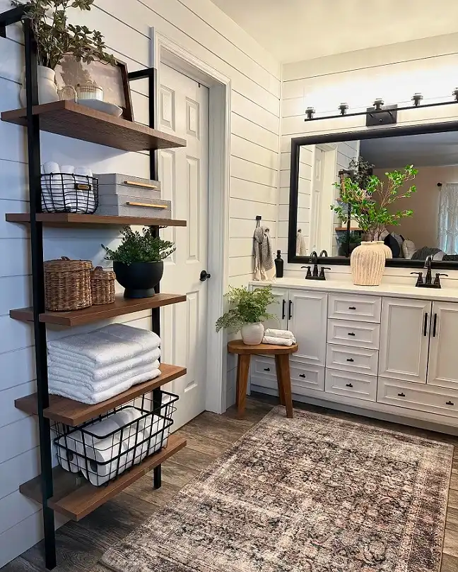 15 Farmhouse Bathroom Ideas on a Budget 2 Lean a Tall Open Shelf Against Shiplap Walls