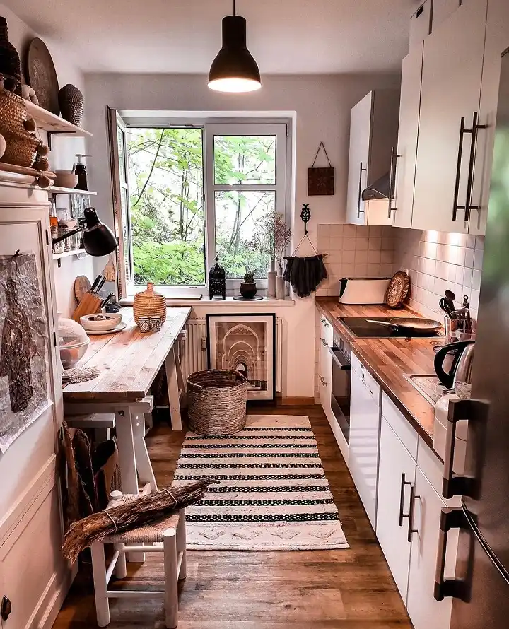 15 Tiny House Kitchen Ideas With Full-Size Function 5 Galley Layout With a Trestle Table for Prep