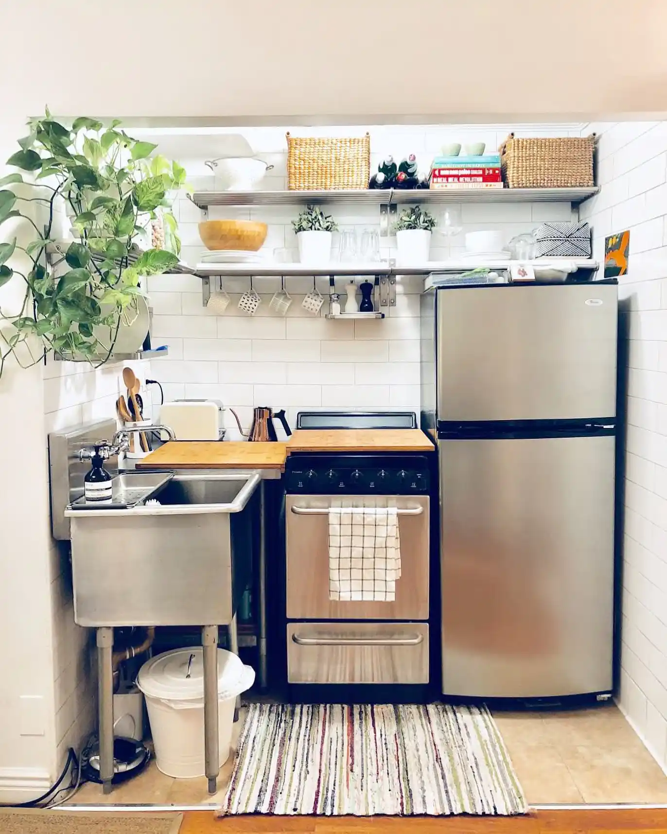 15 Tiny House Kitchen Ideas With Full-Size Function 7 Closet Kitchen With a Utility Sink and Full Fridge